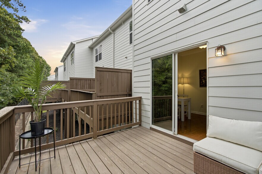 Outdoor private patio with view of lush greenery (rare find in the community!) - 1225 Liberty Pky NW