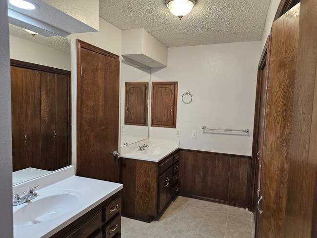 Master Bath with Double Vanities - 2104 NW 118th Ter