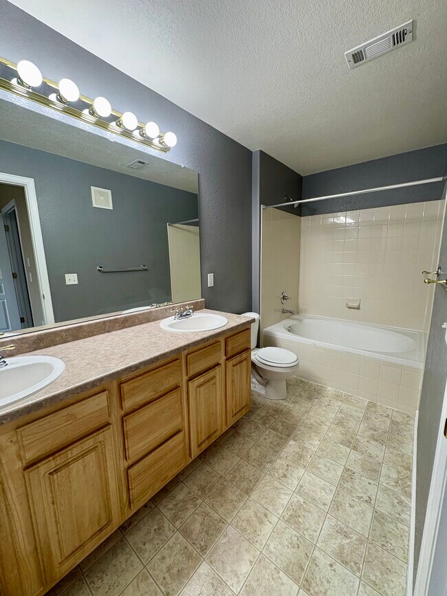 Building Photo - 10311 W Girton Dr