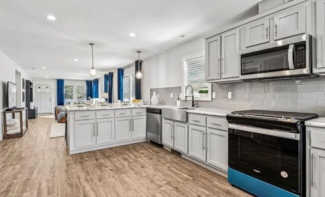 Building Photo - Stunning new home featuring 3 bedroom and ...