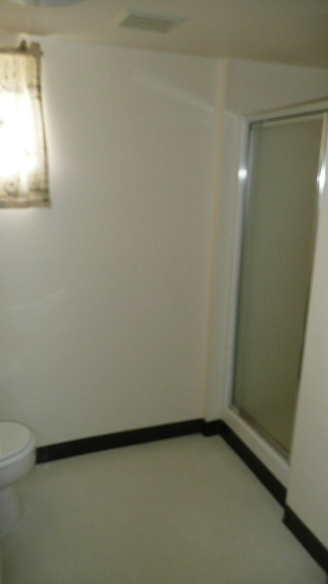 Bathroom in basement with a shower - 7187 N Fiske Ave