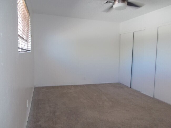 Building Photo - 4-Bedroom Home with Spacious Backyard