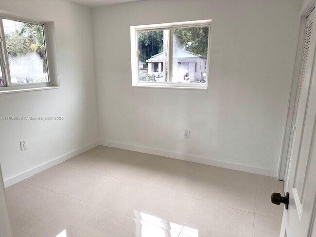 Building Photo - 5480 NW 4th Ave