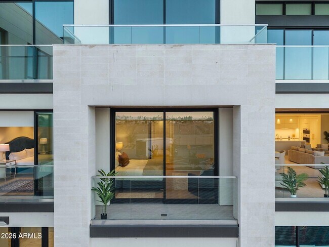 Building Photo - 6587 N Palmeraie Blvd