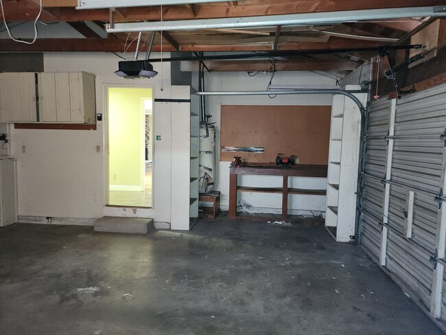 Building Photo - 3 Bedroom 2 bath with 2 car garage off of ...