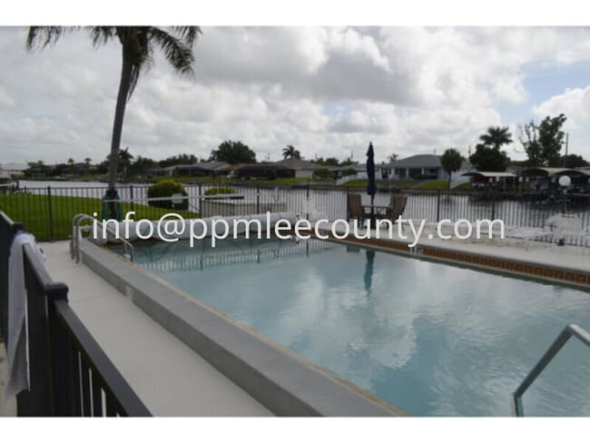 Primary Photo - Ground Floor 2/2 Waterfront Condo with Dock