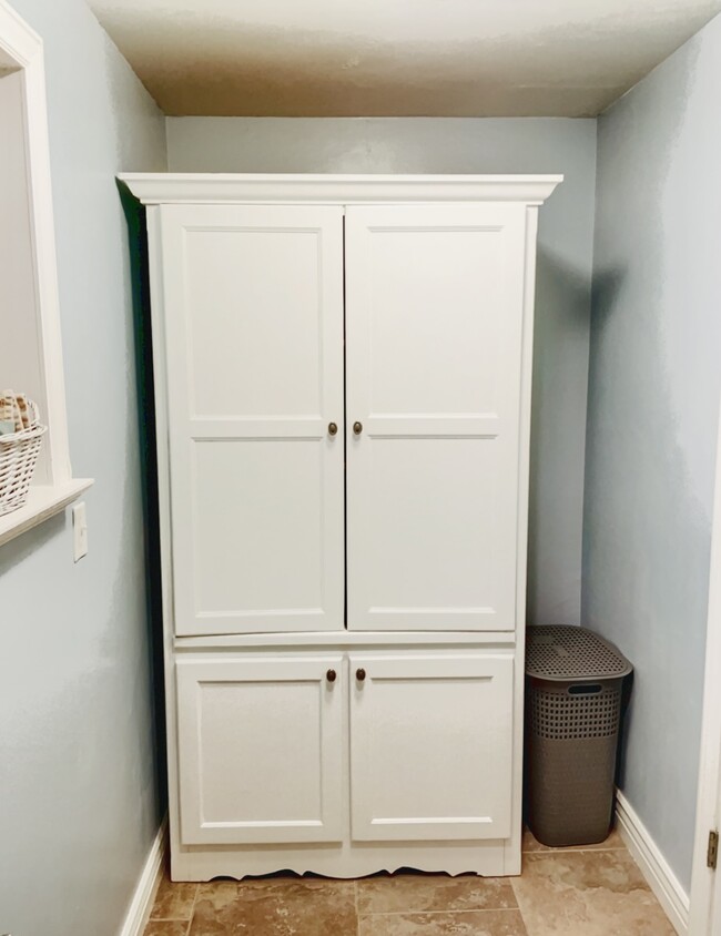 Armoire for bathroom linens. - 80 S Center St