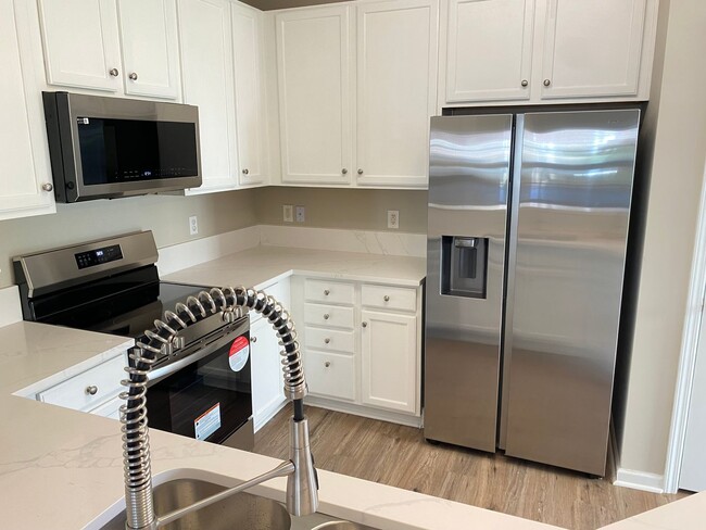 Building Photo - Three Bedroom Townhome In Caldwell Station With primary Bedroom On Main