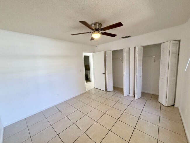 Building Photo - 8715 Pluto Terrace