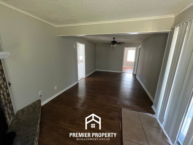 Building Photo - Charming 3BR Home in 38118 | Hardwood Floors & Spacious Fenced Backyard