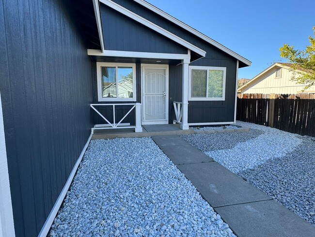 Building Photo - Freshly Remodeled 4 bedroom in Red Rock- RV Parking, low maintenance yard and pets welcome!