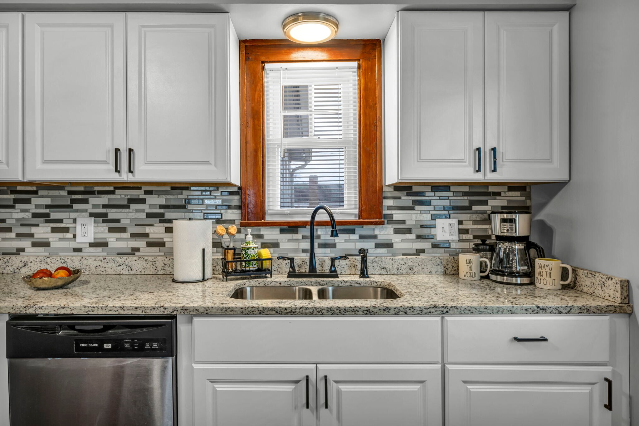 The coffee corner features a 12-cup coffee maker, a mini coffee maker for individual servings - 3386 Westbury Rd