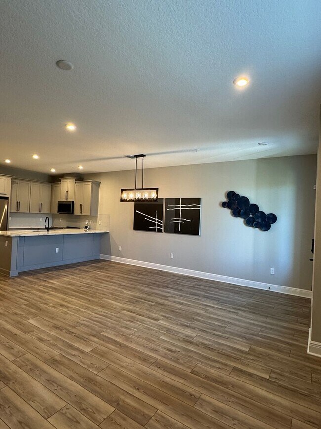 Building Photo - Elegant living in a vibrant, strategically located community—your perfect place to call home.