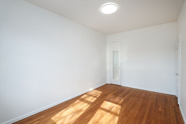 Building Photo - 11525 Metropolitan Avenue, 233