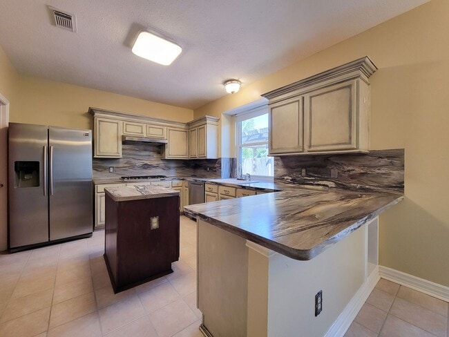 Building Photo - Welcome home to this beautiful 2 story on a cul de sac lot! Fresh paint and Stainless steel appli...