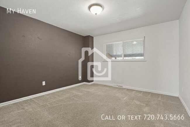 Building Photo - 229 E Iliff Ave