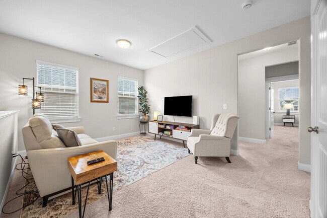 Building Photo - Fully Furnished 3BR Retreat in Riverwalk | Office + Screened Patio