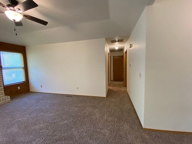 Building Photo - Three bedroom, two bathroom, two car garag...