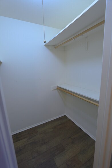 Walk in closet 2nd bedroom - 10941 W Santa Fe Dr