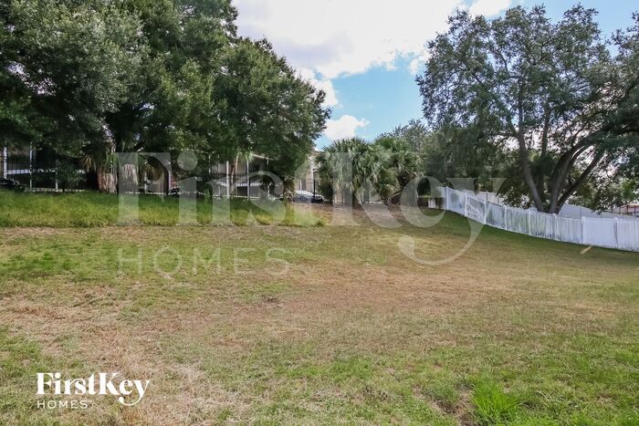 Building Photo - 8443 N River Dune St