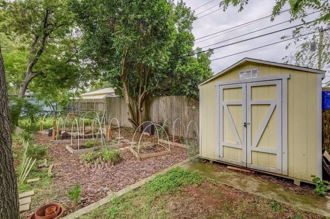 Building Photo - Discover Your Austin Oasis: Revitalized Bungalow with Hardwood Floors and Entertainer's Deck!