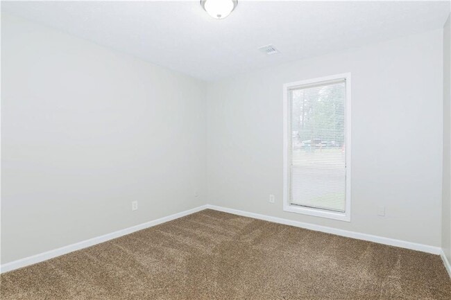 Building Photo - 8671 Woodside Ln