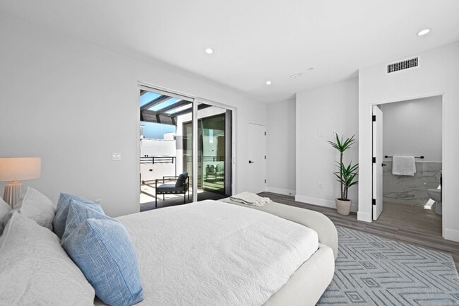 Building Photo - Stunning brand-new 3 Bedroom 4 Bathroom townhouse with private garage and rooftop balcony!