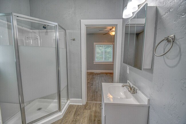 Building Photo - Newly Remodeled Campus Property! Lawn Care Included!