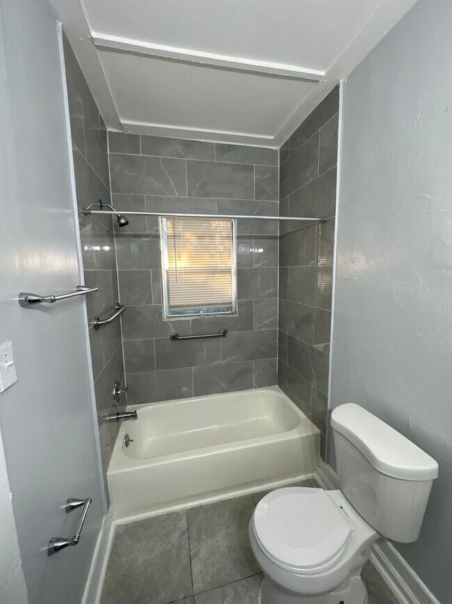 Building Photo - Fully Renovated 2/1 -Single Family Availab...