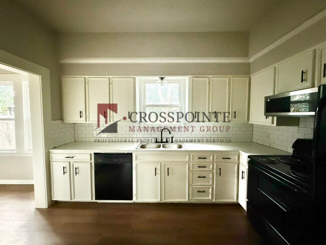 Building Photo - Bright & Modern 1-Bedroom with In-Unit Laundry