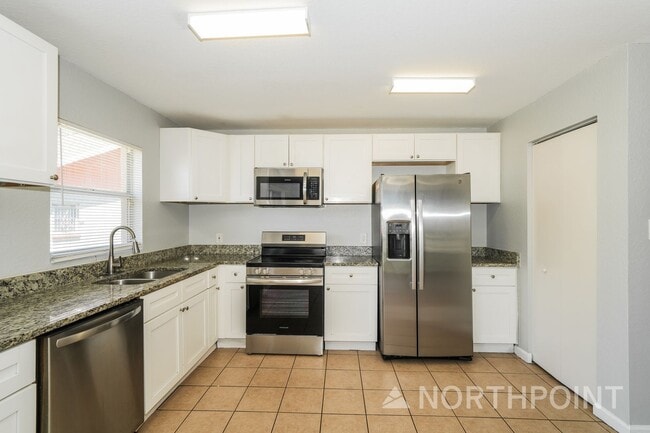 Building Photo - Newly Renovated Single Family Home | 4 BR/2BA | Partially fenced  front yard