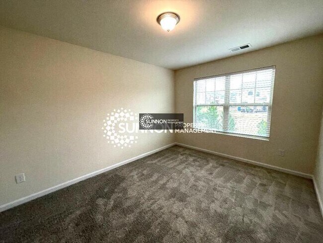 Building Photo - End Unit 3 BR 2.5 BA w/ Garage