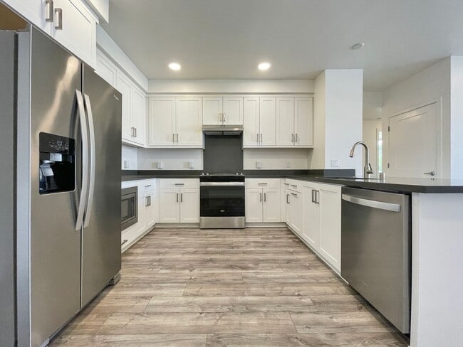 Building Photo - Modern 2BD Fremont Condo – EV Charger, Balcony, & Walk to BART