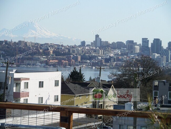 Building Photo - Spectacular VIEW 2 Bedroom+Den Townhome, Zoned For Residential & Commercial Use! Live and Work in...