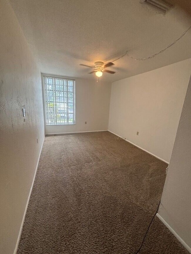 Building Photo - 55+, quaint 2/1 in a great community locat...