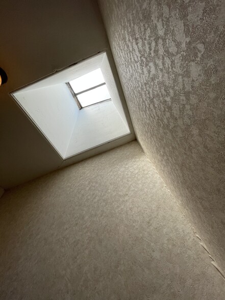 Lots of natural light coming in main stairwell - 107 Otis St