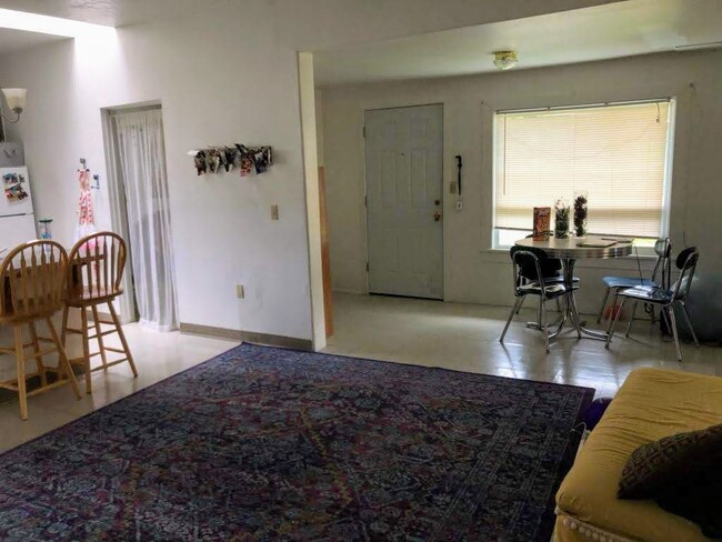 Eating and all-purpose area. To the left is the kitchen, to the right is the living room. Straight ahead is the front entry door - 804 NW 29th St