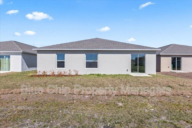 Building Photo - 5131 Magnolia Palm Dr