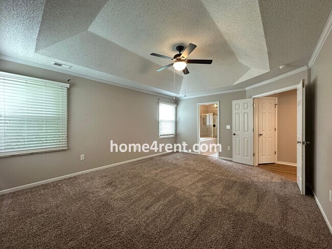 Building Photo - Updated Kitchen, Large Two Tiered Deck, Finished Basement in Blue Valley Schools!