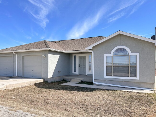 Primary Photo - Inviting Duplex with a Touch of Country Charm