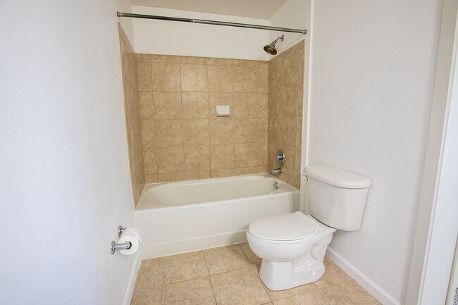 Building Photo - Sweet + secure 1/1 condo with parking, extra storage room