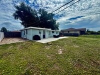 Building Photo - Charming Coastal Cottage with Huge Fenced Yard & Smart Tech!