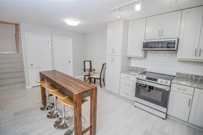 Building Photo - 1410 14th Terrace