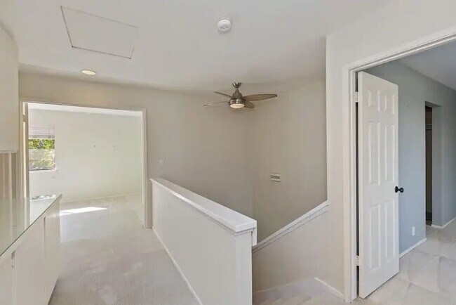 Building Photo - Upgraded La Costa Townhome