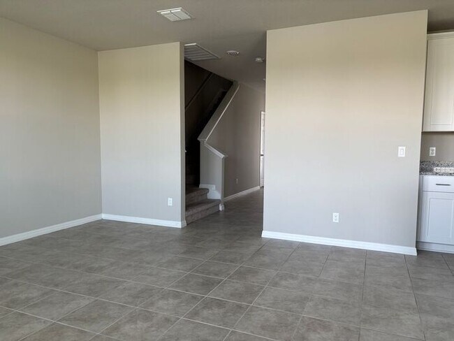Building Photo - Like-New 4 Bedroom 3 Bath with Pond View & Two Living Spaces — Minutes to South Lake Nona