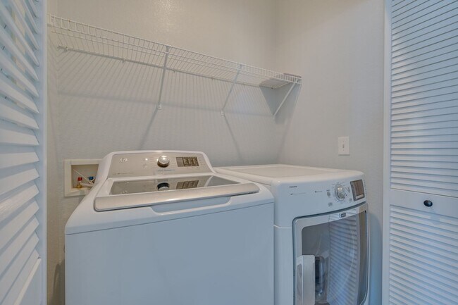 Building Photo - NW!! Gated!! Community Pool/Spa  Recreation Room!! New Paint!! New Flooring!!  Balcony!!  2 car g...