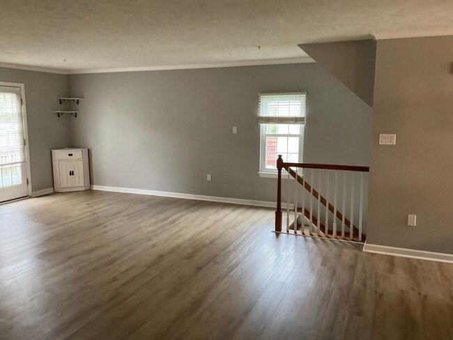 Building Photo - Large 3 Bedroom 2.5 bath townhome with additional finished room.