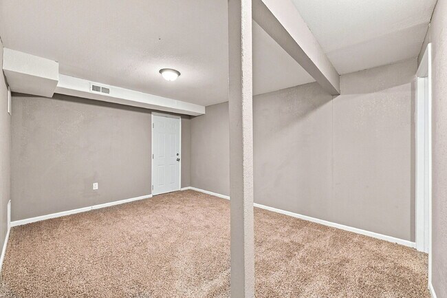 Building Photo - $2,345.95, 5-bed, 2.5-bathroom located in Colorado Springs with a fenced backyard.
