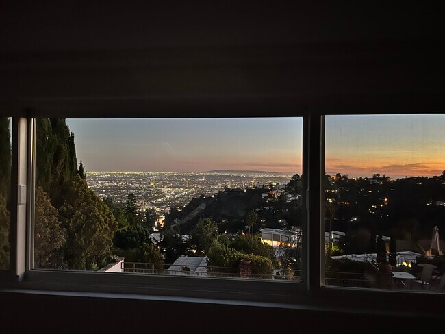 Gorgeous sunset from living room window - 7934 Zeus Dr