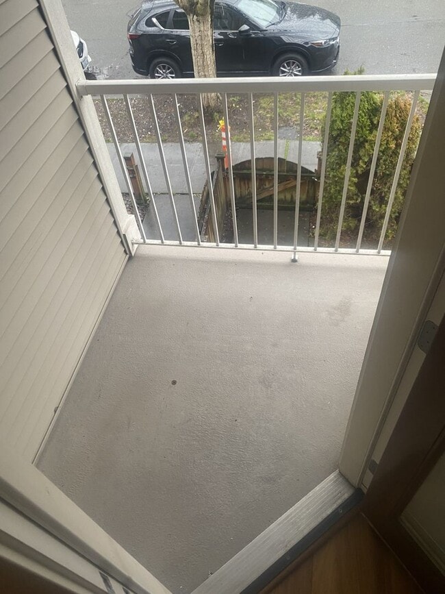 Building Photo - LIKE NEW three bedroom with fantastic updates, one car garage and private newly fenced front patio!